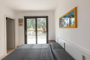 Posteľ alebo postele v izbe v ubytovaní CASA MARGOT