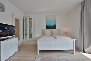 Postel nebo postele na pokoji v ubytování Am Elchgrund Am Elchgrund 7 Appartement 2