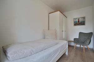 Postel nebo postele na pokoji v ubytování Am Elchgrund Am Elchgrund 7 Appartement 2