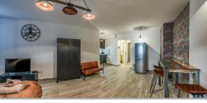 Kuchyňa alebo kuchynka v ubytovaní Duna Aréna Boutique Apartment