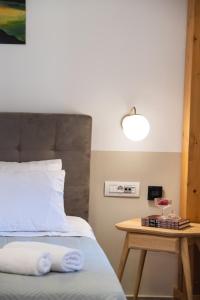 Łóżko lub łóżka w pokoju w obiekcie Avali Design Suites