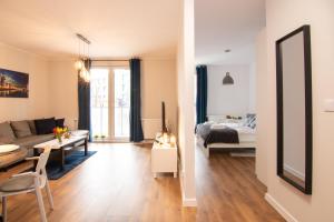 Posteľ alebo postele v izbe v ubytovaní Maya's Flats & Resorts 51 - Aura 40