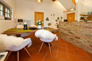 Posezení v ubytování Ferienhaus Rote Scheune