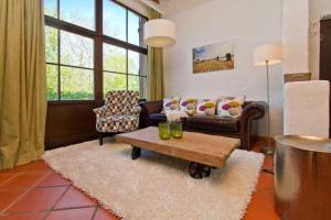 Posezení v ubytování Ferienhaus Rote Scheune