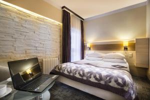 Posteľ alebo postele v izbe v ubytovaní Comfort by Trio