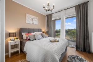 Ένα ή περισσότερα κρεβάτια σε δωμάτιο στο Apartments Karla & Jakov