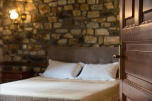A bed or beds in a room at Platanorema