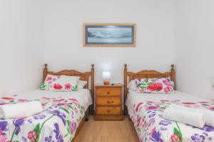 A bed or beds in a room at Villa Luna