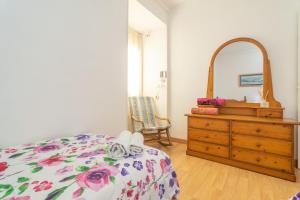 A bed or beds in a room at Villa Luna