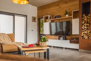 Część wypoczynkowa w obiekcie Apartments Bijou, Nature & Luxury in a green oasis near Umag