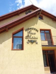 a sign on the side of a building at Casa Spatar in Sibiu