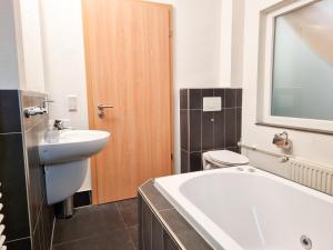 Ένα μπάνιο στο Vakantiehuis VR02 dichtbij strand! +22 φωτογραφίες
