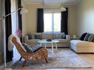 Posezení v ubytování LUČI jūras apartamenti