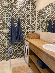 Koupelna v ubytování LUČI jūras apartamenti