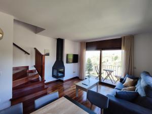 A seating area at Allotjaments Paratge Fabas