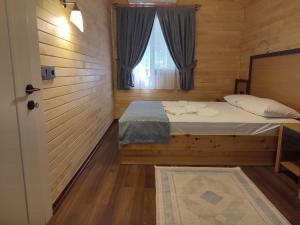 Postel nebo postele na pokoji v ubytování Garden Pansiyon Çıralı