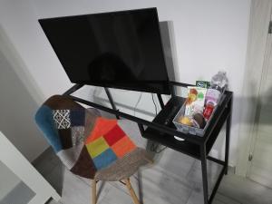 Telewizja i/lub zestaw kina domowego w obiekcie Casa Mia