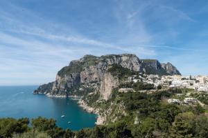 a view of positano on the amalfi coast at Villa Mariuccia Capri in Capri