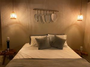 Ein Bett oder Betten in einem Zimmer der Unterkunft Glamping Entrearboles - Bellavista