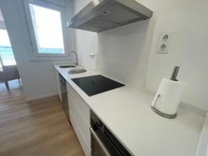 A kitchen or kitchenette at Oktheway Perbes Beach 2