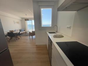 A kitchen or kitchenette at Oktheway Perbes Beach 2