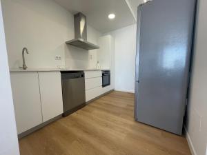 A kitchen or kitchenette at Oktheway Perbes Beach 2