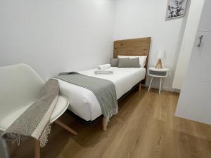 A bed or beds in a room at Oktheway Perbes Beach 2