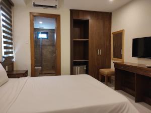 TV a/nebo společenská místnost v ubytování HỒNG HẢI 2 HOTEL