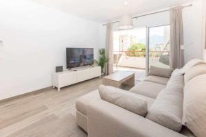 TV a/nebo společenská místnost v ubytování Miramar junto al recinto ferial de Fuengirola