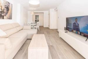 TV a/nebo společenská místnost v ubytování Miramar junto al recinto ferial de Fuengirola