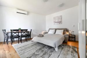 Posteľ alebo postele v izbe v ubytovaní Apartment Canada