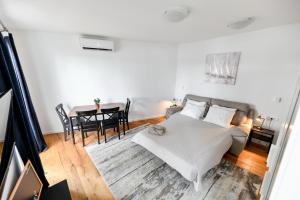 Posteľ alebo postele v izbe v ubytovaní Apartment Canada