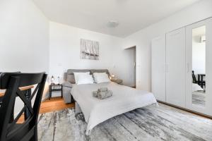 Posteľ alebo postele v izbe v ubytovaní Apartment Canada