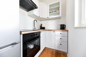 Kuchyňa alebo kuchynka v ubytovaní Apartment Canada
