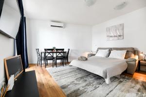 Posteľ alebo postele v izbe v ubytovaní Apartment Canada