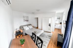 Posteľ alebo postele v izbe v ubytovaní Apartment Canada
