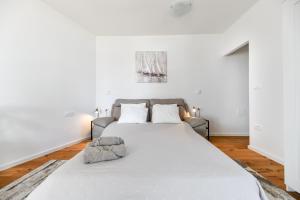 Posteľ alebo postele v izbe v ubytovaní Apartment Canada