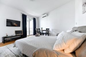 Posteľ alebo postele v izbe v ubytovaní Apartment Canada
