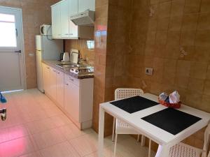 Kuchyň nebo kuchyňský kout v ubytování Hotel Andrea´s