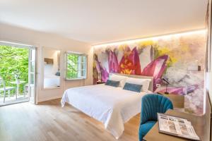 Postel nebo postele na pokoji v ubytování La Madernassa Resort - Casalora Dimora Storica di Charme + 37 fotografií