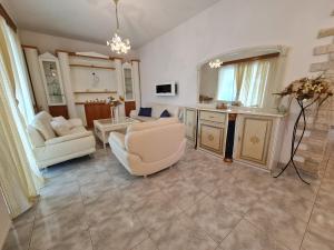 A television and/or entertainment centre at Myrtia Guest House