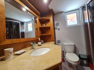 A bathroom at Myrtia Guest House