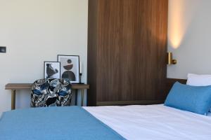 Posteľ alebo postele v izbe v ubytovaní Filopappou Hill Suites by Athens Stay