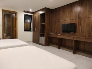 TV a/nebo společenská místnost v ubytování HỒNG HẢI 2 HOTEL