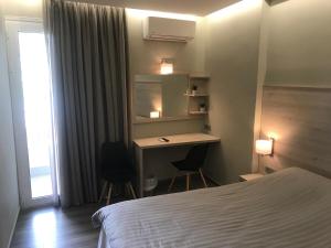 Voodi või voodid majutusasutuse Plaza Hotel toas