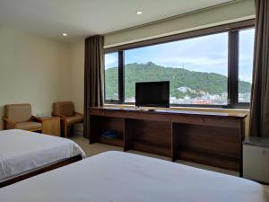 Nespecifikovaný výhled na hory nebo výhled na hory při pohledu z hotelu