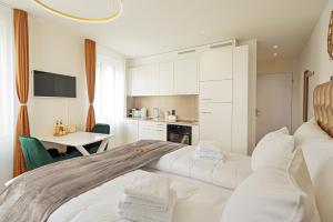 Kuchyň nebo kuchyňský kout v ubytování EH Apartments Merkur