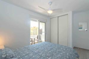 Łóżko lub łóżka w pokoju w obiekcie Casablanca 3 Apartamento con vistas al mar,