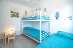 Łóżko lub łóżka w pokoju w obiekcie Casablanca 3 Apartamento con vistas al mar,