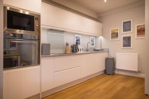 Η κουζίνα ή μικρή κουζίνα στο Howe Keld 2 Ground Floor +17 φωτογραφίες